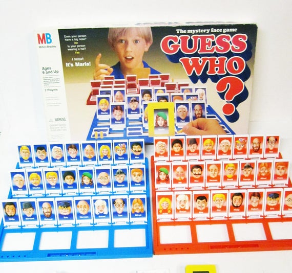 Guess who is a two-player guessing game where each player selects a card containing a cartoon character.  Each player has boards with all 24 possible cartoon characters that make up the deck of cards.  Players will take turns asking yes or no questions - for example: 'Does the person on your card have orange hair?'  The other player will answer yes or no, then the person asking the question will flip all the faces down on their board to narrow down the possible characters that the other player has for their card.  After enough questions have been asked, you can narrow down what character the other player has for their card and win the game.  Each time a player takes a turn in the game, they are provided with 1 bit of information.